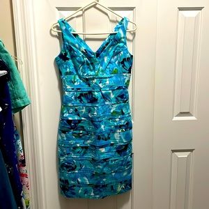 This is an American Living dress, It is a size 2, and is form fitting, fits well